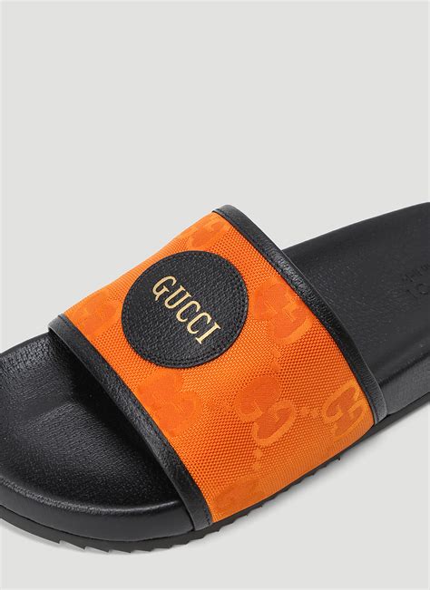 orange Gucci slides